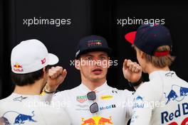 (L to R): Pierre Gasly (FRA) Scuderia Toro Rosso with Max Verstappen (NLD) Red Bull Racing and Brendon Hartley (NZL) Scuderia Toro Rosso. 05.04.2018. Formula 1 World Championship, Rd 2, Bahrain Grand Prix, Sakhir, Bahrain, Preparation Day.