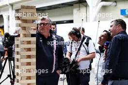 Otmar Szafnauer (USA) Racing Point Force India F1 Team Principal and CEO plays giant Jenga with Claire Williams (GBR) Williams Deputy Team Principal and David Croft (GBR) Sky Sports Commentator. 09.11.2018. Formula 1 World Championship, Rd 20, Brazilian Grand Prix, Sao Paulo, Brazil, Practice Day.