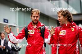 (L to R): Sebastian Vettel (GER) Ferrari with Antti Kontsas (FIN) Personal Trainer. 09.11.2018. Formula 1 World Championship, Rd 20, Brazilian Grand Prix, Sao Paulo, Brazil, Practice Day.
