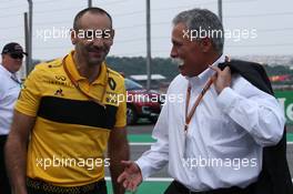 Cyril Abiteboul (FRA) Renault Sport F1 Managing Director  and Chase Carey (USA) Formula One Group Chairman 11.11.2018. Formula 1 World Championship, Rd 20, Brazilian Grand Prix, Sao Paulo, Brazil, Race Day.