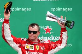 Kimi Raikkonen (FIN) Ferrari celebrates his third position on the podium. 11.11.2018. Formula 1 World Championship, Rd 20, Brazilian Grand Prix, Sao Paulo, Brazil, Race Day.