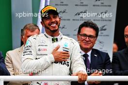 Race winner Lewis Hamilton (GBR) Mercedes AMG F1 celebrates on the podium. 11.11.2018. Formula 1 World Championship, Rd 20, Brazilian Grand Prix, Sao Paulo, Brazil, Race Day.