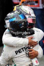 Race winner Lewis Hamilton (GBR) Mercedes AMG F1 celebrates with team mate Valtteri Bottas (FIN) Mercedes AMG F1 in parc ferme. 11.11.2018. Formula 1 World Championship, Rd 20, Brazilian Grand Prix, Sao Paulo, Brazil, Race Day.