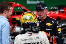 (L to R): Paul di Resta (GBR) Sky Sports F1 Presenter with race winner Lewis Hamilton (GBR) Mercedes AMG F1 and second placed Max Verstappen (NLD) Red Bull Racing in parc ferme. 11.11.2018. Formula 1 World Championship, Rd 20, Brazilian Grand Prix, Sao Paulo, Brazil, Race Day.
