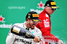 Race winner Lewis Hamilton (GBR) Mercedes AMG F1 celebrates on the podium. 11.11.2018. Formula 1 World Championship, Rd 20, Brazilian Grand Prix, Sao Paulo, Brazil, Race Day.