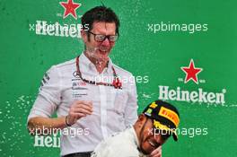 Andrew Shovlin (GBR) Mercedes AMG F1 Engineer celebrates on the podium with race winner Lewis Hamilton (GBR) Mercedes AMG F1. 11.11.2018. Formula 1 World Championship, Rd 20, Brazilian Grand Prix, Sao Paulo, Brazil, Race Day.