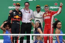 1st place Lewis Hamilton (GBR) Mercedes AMG F1 W09, 2nd Max Verstappen (NLD) Red Bull Racing RB14 and 3rd place Kimi Raikkonen (FIN) Ferrari SF71H. 11.11.2018. Formula 1 World Championship, Rd 20, Brazilian Grand Prix, Sao Paulo, Brazil, Race Day.