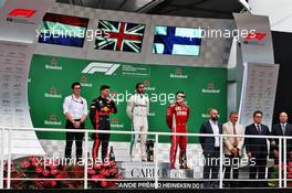 The podium (L to R): Max Verstappen (NLD) Red Bull Racing, second; Lewis Hamilton (GBR) Mercedes AMG F1, race winner; Kimi Raikkonen (FIN) Ferrari, third. 11.11.2018. Formula 1 World Championship, Rd 20, Brazilian Grand Prix, Sao Paulo, Brazil, Race Day.