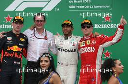 1st place Lewis Hamilton (GBR) Mercedes AMG F1 W09, 2nd place Max Verstappen (NLD) Red Bull Racing RB14 and 3rd polace Kimi Raikkonen (FIN) Ferrari SF71H. 11.11.2018. Formula 1 World Championship, Rd 20, Brazilian Grand Prix, Sao Paulo, Brazil, Race Day.