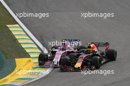 Max Verstappen (NLD) Red Bull Racing RB14 and Esteban Ocon (FRA) Racing Point Force India F1 VJM11 collide. 11.11.2018. Formula 1 World Championship, Rd 20, Brazilian Grand Prix, Sao Paulo, Brazil, Race Day.