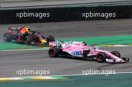 Max Verstappen (NLD) Red Bull Racing and Esteban Ocon (FRA) Force India F1  11.11.2018. Formula 1 World Championship, Rd 20, Brazilian Grand Prix, Sao Paulo, Brazil, Race Day.