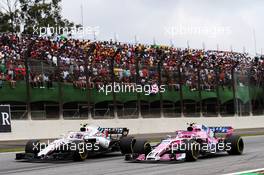 Sergey Sirotkin (RUS) Williams FW41 and Esteban Ocon (FRA) Racing Point Force India F1 VJM11 battle for position. 11.11.2018. Formula 1 World Championship, Rd 20, Brazilian Grand Prix, Sao Paulo, Brazil, Race Day.