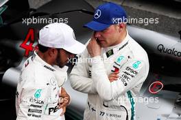 (L to R): Pole sitter Lewis Hamilton (GBR) Mercedes AMG F1 in qualifying parc ferme with third placed team mate Valtteri Bottas (FIN) Mercedes AMG F1. 10.11.2018. Formula 1 World Championship, Rd 20, Brazilian Grand Prix, Sao Paulo, Brazil, Qualifying Day.