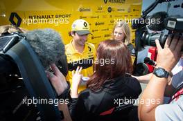 Carlos Sainz Jr (ESP) Renault Sport F1 Team with the media. 08.06.2018. Formula 1 World Championship, Rd 7, Canadian Grand Prix, Montreal, Canada, Practice Day.