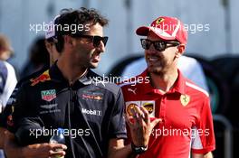 (L to R): Daniel Ricciardo (AUS) Red Bull Racing with Sebastian Vettel (GER) Ferrari. 08.06.2018. Formula 1 World Championship, Rd 7, Canadian Grand Prix, Montreal, Canada, Practice Day.