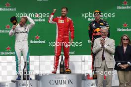 1st place Sebastian Vettel (GER) Ferrari SF71H with 2nd place Valtteri Bottas (FIN) Mercedes AMG F1 and 3rd place Max Verstappen (NLD) Red Bull Racing RB14. 10.06.2018. Formula 1 World Championship, Rd 7, Canadian Grand Prix, Montreal, Canada, Race Day.