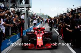 Race winner Sebastian Vettel (GER) Ferrari SF71H enters parc ferme. 10.06.2018. Formula 1 World Championship, Rd 7, Canadian Grand Prix, Montreal, Canada, Race Day.
