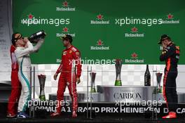 1st place Sebastian Vettel (GER) Ferrari SF71H with 2nd place Valtteri Bottas (FIN) Mercedes AMG F1 and 3rd place Max Verstappen (NLD) Red Bull Racing RB14. 10.06.2018. Formula 1 World Championship, Rd 7, Canadian Grand Prix, Montreal, Canada, Race Day.