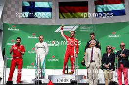 The podium (L to R): Valtteri Bottas (FIN) Mercedes AMG F1, second; Sebastian Vettel (GER) Ferrari, race winner; Max Verstappen (NLD) Red Bull Racing, third. 10.06.2018. Formula 1 World Championship, Rd 7, Canadian Grand Prix, Montreal, Canada, Race Day.