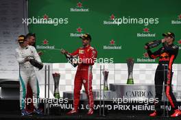 1st place Sebastian Vettel (GER) Ferrari SF71H with 2nd place Valtteri Bottas (FIN) Mercedes AMG F1 and 3rd place Max Verstappen (NLD) Red Bull Racing RB14. 10.06.2018. Formula 1 World Championship, Rd 7, Canadian Grand Prix, Montreal, Canada, Race Day.