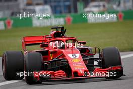 Sebastian Vettel (GER) Scuderia Ferrari  10.06.2018. Formula 1 World Championship, Rd 7, Canadian Grand Prix, Montreal, Canada, Race Day.