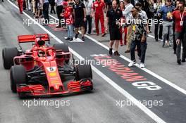 Race winner Sebastian Vettel (GER) Ferrari SF71H enters parc ferme at the end of the race. 10.06.2018. Formula 1 World Championship, Rd 7, Canadian Grand Prix, Montreal, Canada, Race Day.