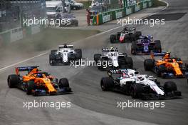 Fernando Alonso (ESP) McLaren MCL33 and Lance Stroll (CDN) Williams FW41 at the start of the race. 10.06.2018. Formula 1 World Championship, Rd 7, Canadian Grand Prix, Montreal, Canada, Race Day.