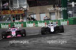 Sergio Perez (MEX) Sahara Force India F1 VJM11 and Sergey Sirotkin (RUS) Williams FW41 battle for position. 10.06.2018. Formula 1 World Championship, Rd 7, Canadian Grand Prix, Montreal, Canada, Race Day.