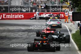 Max Verstappen (NLD) Red Bull Racing RB14 behind the FIA Safety Car. 10.06.2018. Formula 1 World Championship, Rd 7, Canadian Grand Prix, Montreal, Canada, Race Day.