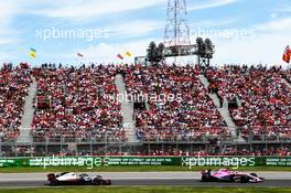 Sergio Perez (MEX) Sahara Force India F1 VJM11 leads Kevin Magnussen (DEN) Haas VF-18. 10.06.2018. Formula 1 World Championship, Rd 7, Canadian Grand Prix, Montreal, Canada, Race Day.