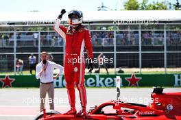 Sebastian Vettel (GER) Ferrari SF71H celebrates his pole position in qualifying parc ferme. 09.06.2018. Formula 1 World Championship, Rd 7, Canadian Grand Prix, Montreal, Canada, Qualifying Day.