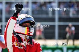 Sebastian Vettel (GER) Ferrari celebrates his pole position in qualifying parc ferme. 09.06.2018. Formula 1 World Championship, Rd 7, Canadian Grand Prix, Montreal, Canada, Qualifying Day.