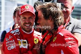 Sebastian Vettel (GER) Ferrari celebrates his pole position in qualifying parc ferme with Antti Kontsas (FIN) Personal Trainer. 09.06.2018. Formula 1 World Championship, Rd 7, Canadian Grand Prix, Montreal, Canada, Qualifying Day.