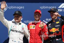 pole for Sebastian Vettel (GER) Ferrari SF71H, 2nd for Valtteri Bottas (FIN) Mercedes AMG F1 and 34d for Max Verstappen (NLD) Red Bull Racing RB14. 09.06.2018. Formula 1 World Championship, Rd 7, Canadian Grand Prix, Montreal, Canada, Qualifying Day.