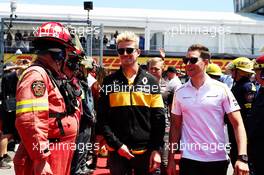 (L to R): Nico Hulkenberg (GER) Renault Sport F1 Team with Stoffel Vandoorne (BEL) McLaren on the drivers parade. 10.06.2018. Formula 1 World Championship, Rd 7, Canadian Grand Prix, Montreal, Canada, Race Day.