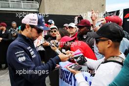 Sergio Perez (MEX) Sahara Force India F1 signs autographs for the fans. 07.06.2018. Formula 1 World Championship, Rd 7, Canadian Grand Prix, Montreal, Canada, Preparation Day.