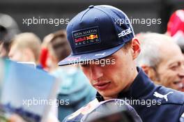 Max Verstappen (NLD) Red Bull Racing signs autographs for the fans. 07.06.2018. Formula 1 World Championship, Rd 7, Canadian Grand Prix, Montreal, Canada, Preparation Day.