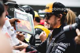 Fernando Alonso (ESP) McLaren signs autographs for the fans. 07.06.2018. Formula 1 World Championship, Rd 7, Canadian Grand Prix, Montreal, Canada, Preparation Day.