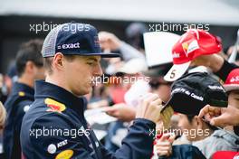 Max Verstappen (NLD) Red Bull Racing signs autographs for the fans. 07.06.2018. Formula 1 World Championship, Rd 7, Canadian Grand Prix, Montreal, Canada, Preparation Day.