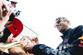 Daniel Ricciardo (AUS) Red Bull Racing signs autographs for the fans. 07.06.2018. Formula 1 World Championship, Rd 7, Canadian Grand Prix, Montreal, Canada, Preparation Day.
