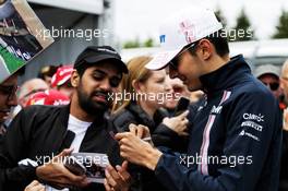 Esteban Ocon (FRA) Sahara Force India F1 Team signs autographs for the fans. 07.06.2018. Formula 1 World Championship, Rd 7, Canadian Grand Prix, Montreal, Canada, Preparation Day.