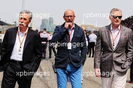 (L to R): Chase Carey (USA) Formula One Group Chairman with Norman Howell (GBR) Formula One Director of Communications and Sean Bratches (USA) Formula 1 Managing Director, Commercial Operations. 15.04.2018. Formula 1 World Championship, Rd 3, Chinese Grand Prix, Shanghai, China, Race Day.