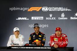 The post race FIA Press Conference (L to R): Valtteri Bottas (FIN) Mercedes AMG F1, second; Daniel Ricciardo (AUS) Red Bull Racing, race winner; Kimi Raikkonen (FIN) Ferrari, third. 15.04.2018. Formula 1 World Championship, Rd 3, Chinese Grand Prix, Shanghai, China, Race Day.