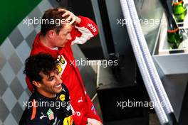 Race winner Daniel Ricciardo (AUS) Red Bull Racing on the podium with third placed Kimi Raikkonen (FIN) Ferrari. 15.04.2018. Formula 1 World Championship, Rd 3, Chinese Grand Prix, Shanghai, China, Race Day.