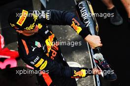 Race winner Daniel Ricciardo (AUS) Red Bull Racing celebrates on the podium. 15.04.2018. Formula 1 World Championship, Rd 3, Chinese Grand Prix, Shanghai, China, Race Day.