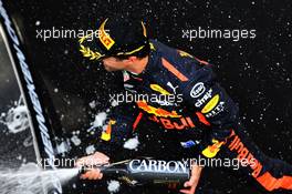 Race winner Daniel Ricciardo (AUS) Red Bull Racing celebrates on the podium. 15.04.2018. Formula 1 World Championship, Rd 3, Chinese Grand Prix, Shanghai, China, Race Day.