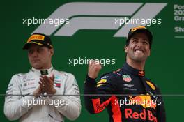 Valtteri Bottas (FIN) Mercedes AMG F1 and 1st place Daniel Ricciardo (AUS) Red Bull Racing RB14.  15.04.2018. Formula 1 World Championship, Rd 3, Chinese Grand Prix, Shanghai, China, Race Day.