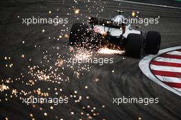 Kevin Magnussen (DEN) Haas VF-18 sends sparks flying. 14.04.2018. Formula 1 World Championship, Rd 3, Chinese Grand Prix, Shanghai, China, Qualifying Day.