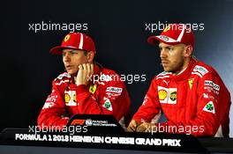 (L to R): Kimi Raikkonen (FIN) Ferrari and Sebastian Vettel (GER) Ferrari in the FIA Press Conference. 14.04.2018. Formula 1 World Championship, Rd 3, Chinese Grand Prix, Shanghai, China, Qualifying Day.