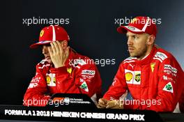 (L to R): Kimi Raikkonen (FIN) Ferrari and Sebastian Vettel (GER) Ferrari in the FIA Press Conference. 14.04.2018. Formula 1 World Championship, Rd 3, Chinese Grand Prix, Shanghai, China, Qualifying Day.